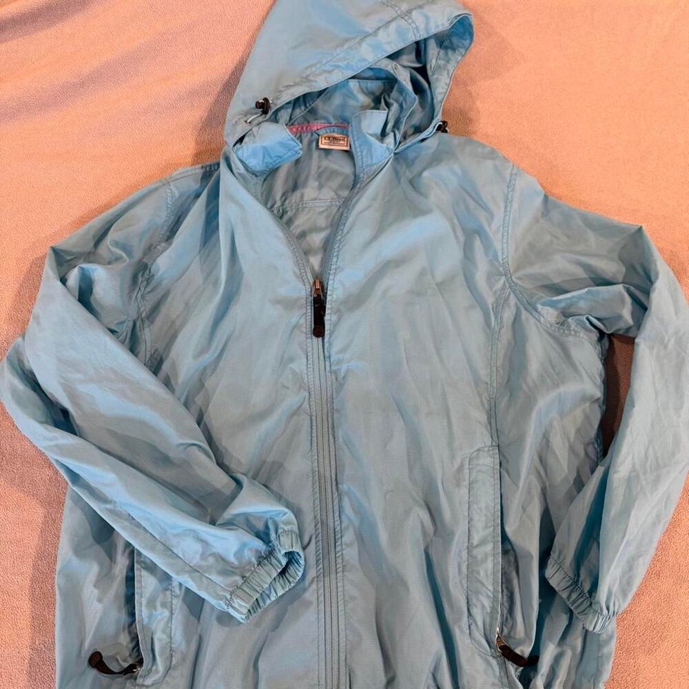 Light blue windbreaker jacket